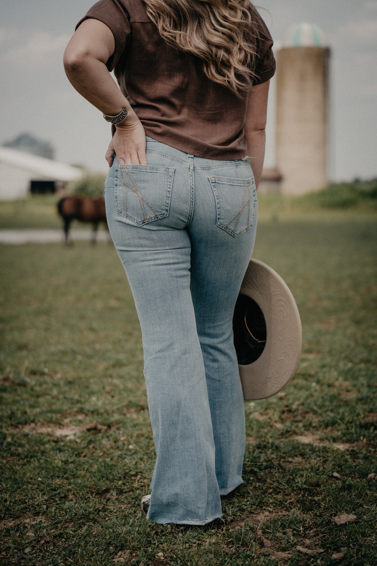 'Hallie' Mid Rise Flare Jean with Raw Hem by Ariat