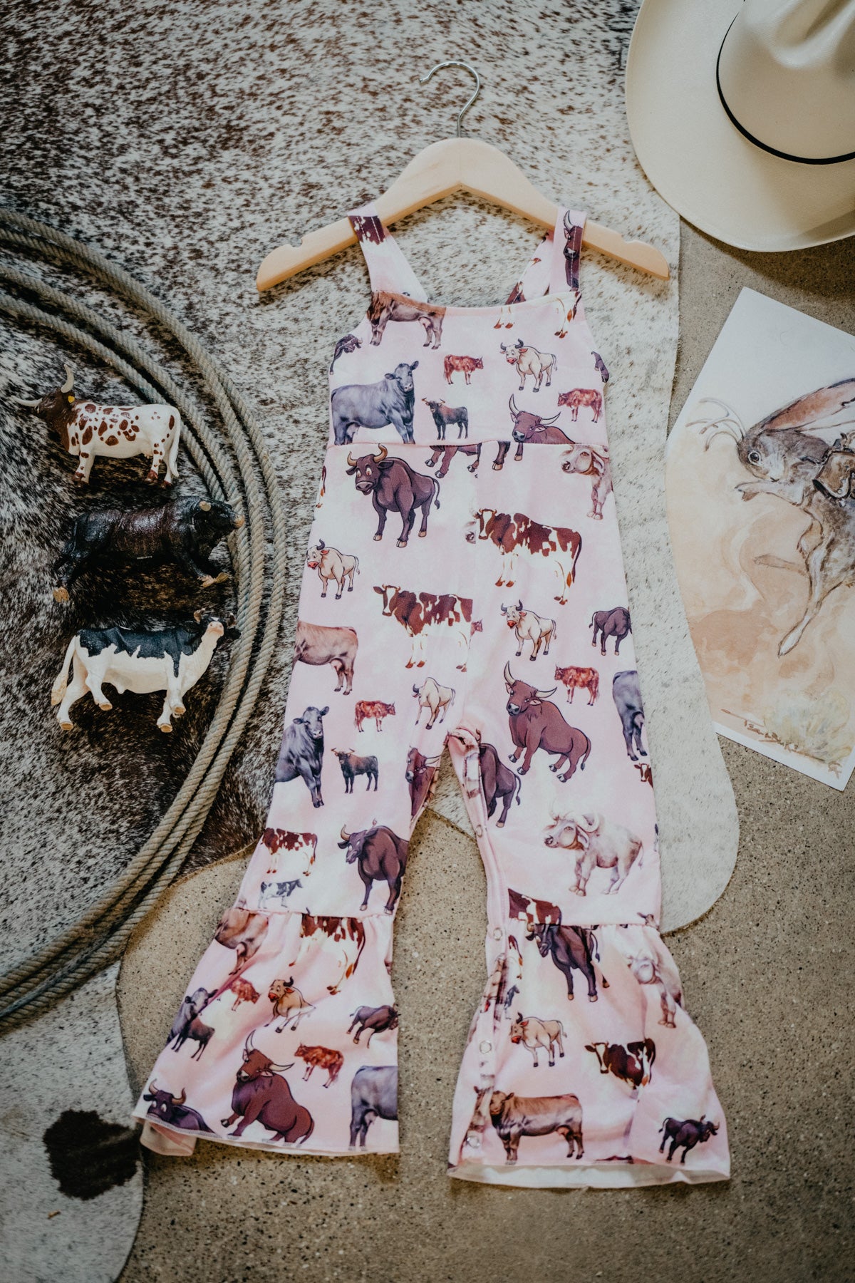 Cow Print Pink Bell Jumpsuit (12-18M to 8/9T)