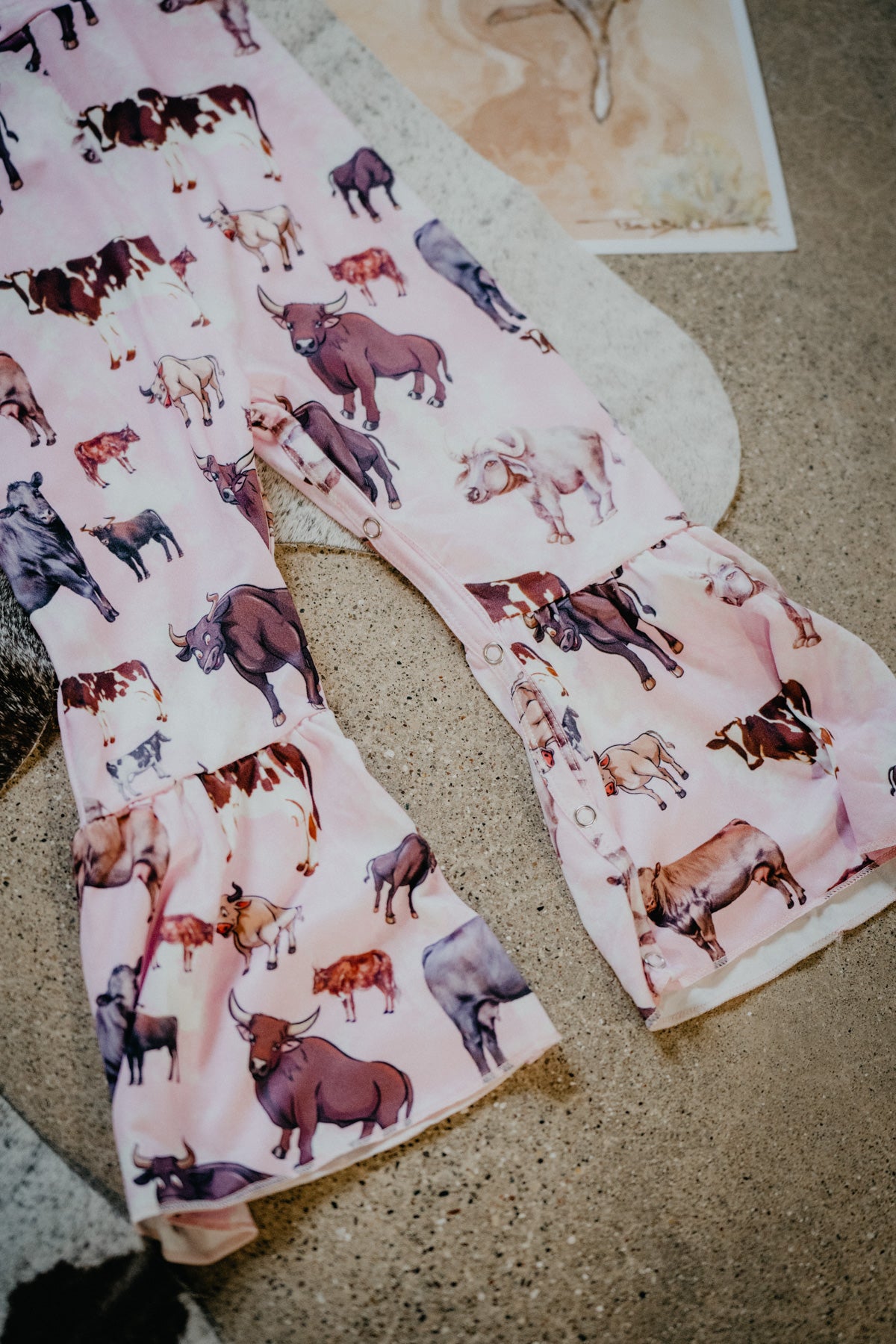 Cow Print Pink Bell Jumpsuit (12-18M to 8/9T)
