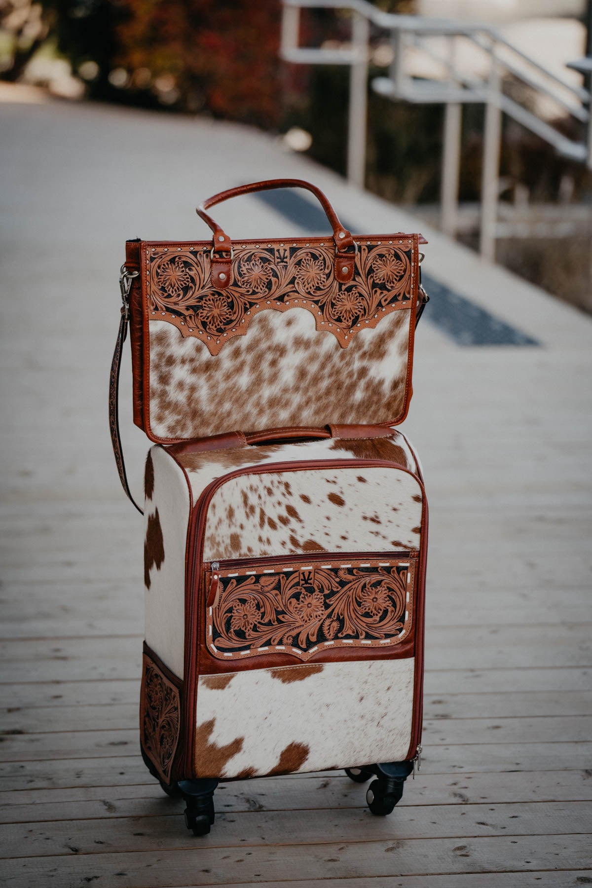 Rolling Tooled Leather and Cowhide Suitcase